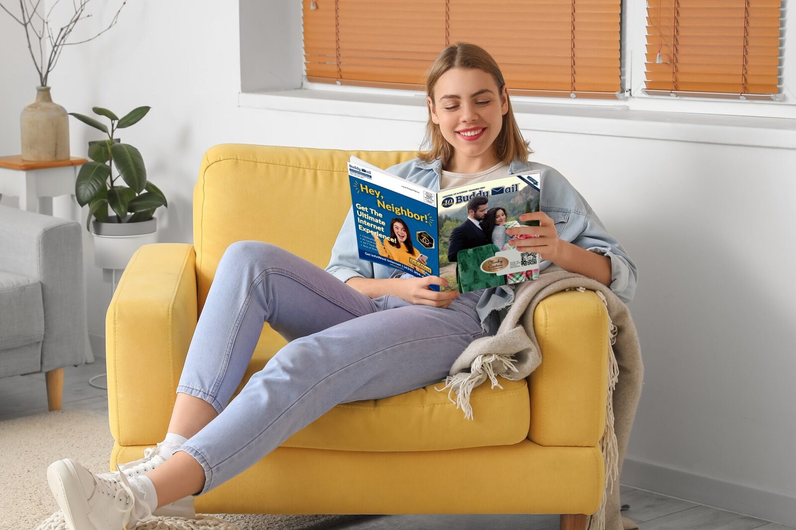 A customer reading Buddy Mail magazine at home
